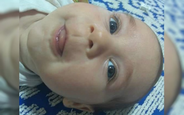 Bebê Michel, de 6 meses, que morreu com tiro no peito em Luziânia; pai foi preso suspeito do crime — Foto: Reprodução/TV Anhanguera