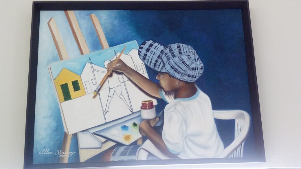 Celulose vira arte na mão de três-lagoenses Obra Eflay - menino pintor, de Nilva Barrozo. Imagem de um de seus alunos nos projetos sociais acabou virando tela para a artista.