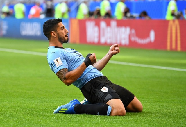 Oitavas de final da Copa terão Uruguai x Portugal e Espanha x Rússia Uruguai de Luis Suárez terminou a fase de grupos com 100% de aproveitamento (Foto: Dylan Martinez/Reuters)
